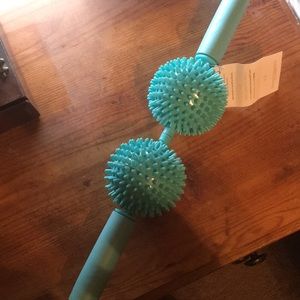 57 physique teal Massage Roller with tags on.